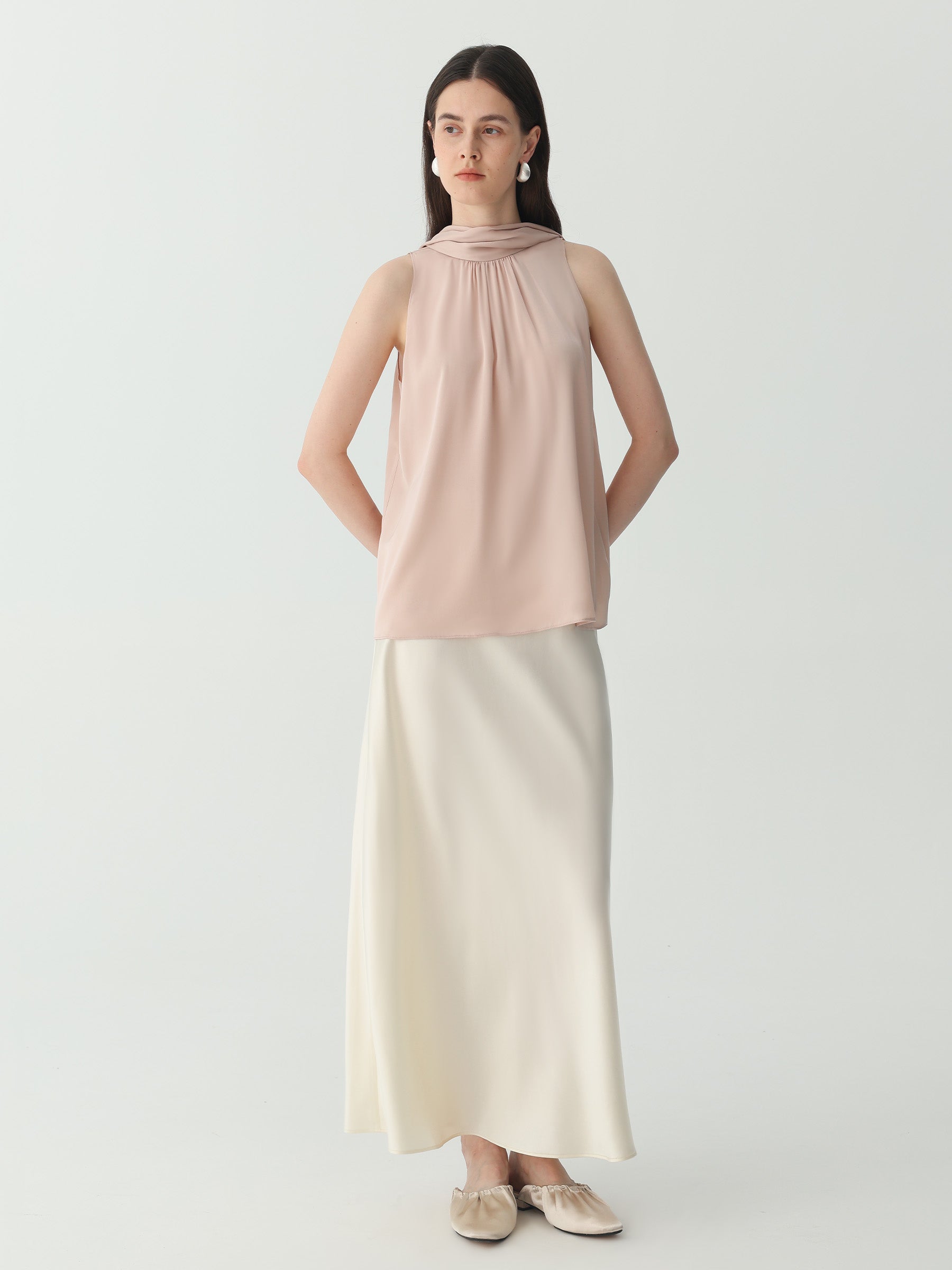 Sleeveless Turtleneck Ribbon Blouse in Silk #color_Pink-Cinnamon