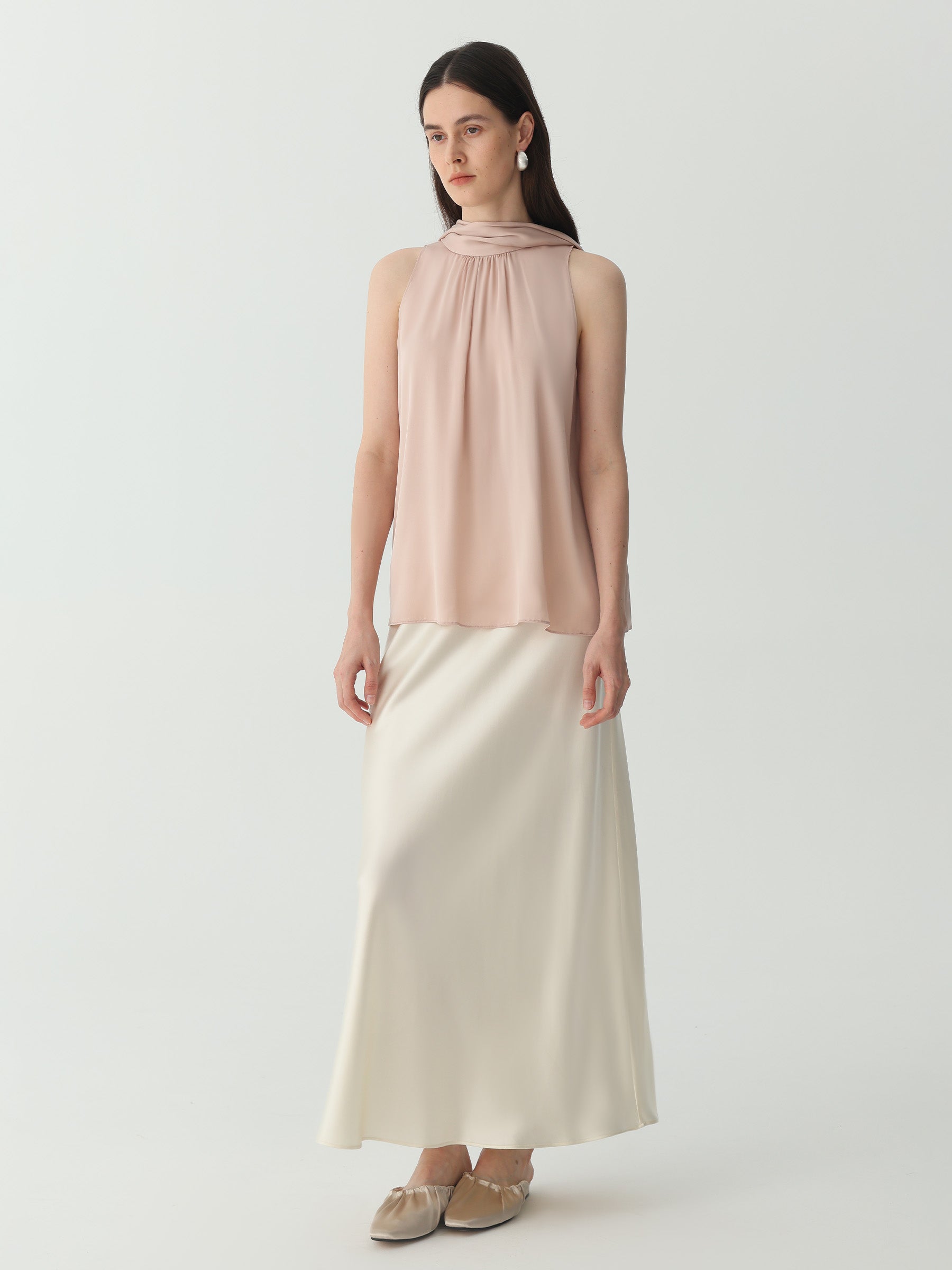 Sleeveless Turtleneck Ribbon Blouse in Silk #color_Pink-Cinnamon
