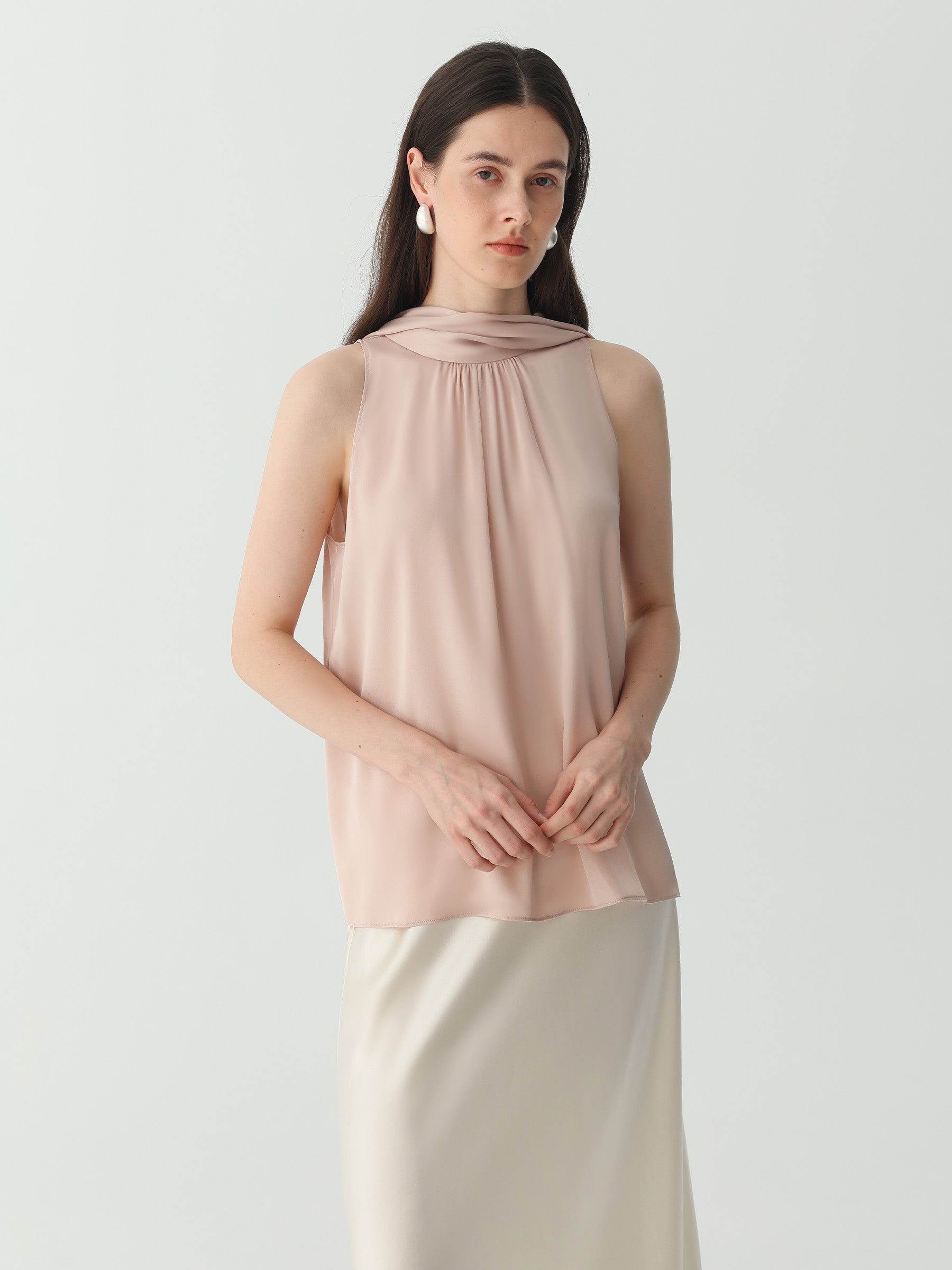 Sleeveless Turtleneck Ribbon Blouse in Silk #color_Pink-Cinnamon