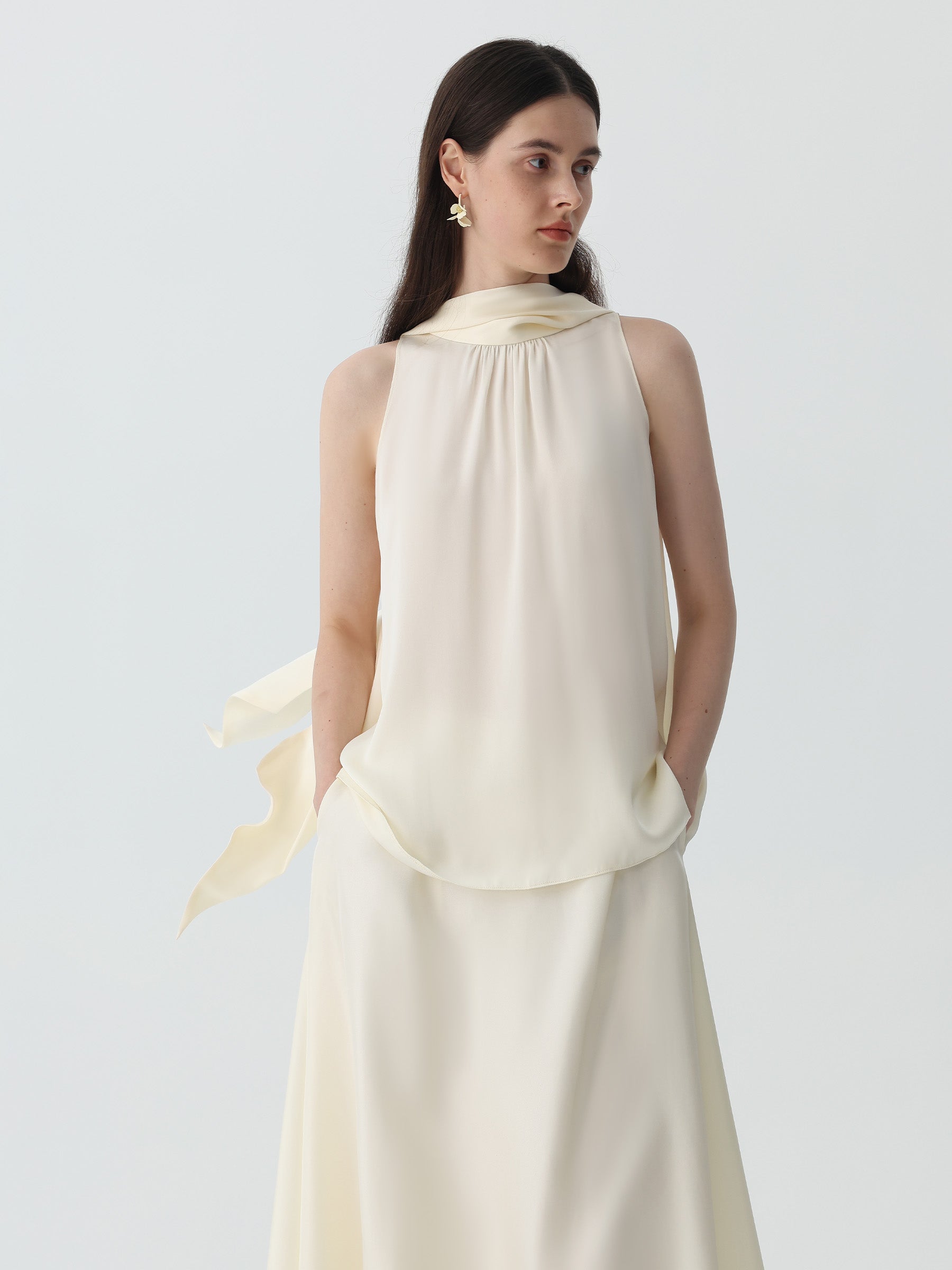 Sleeveless Turtleneck Ribbon Blouse in Silk #color_Ivory White