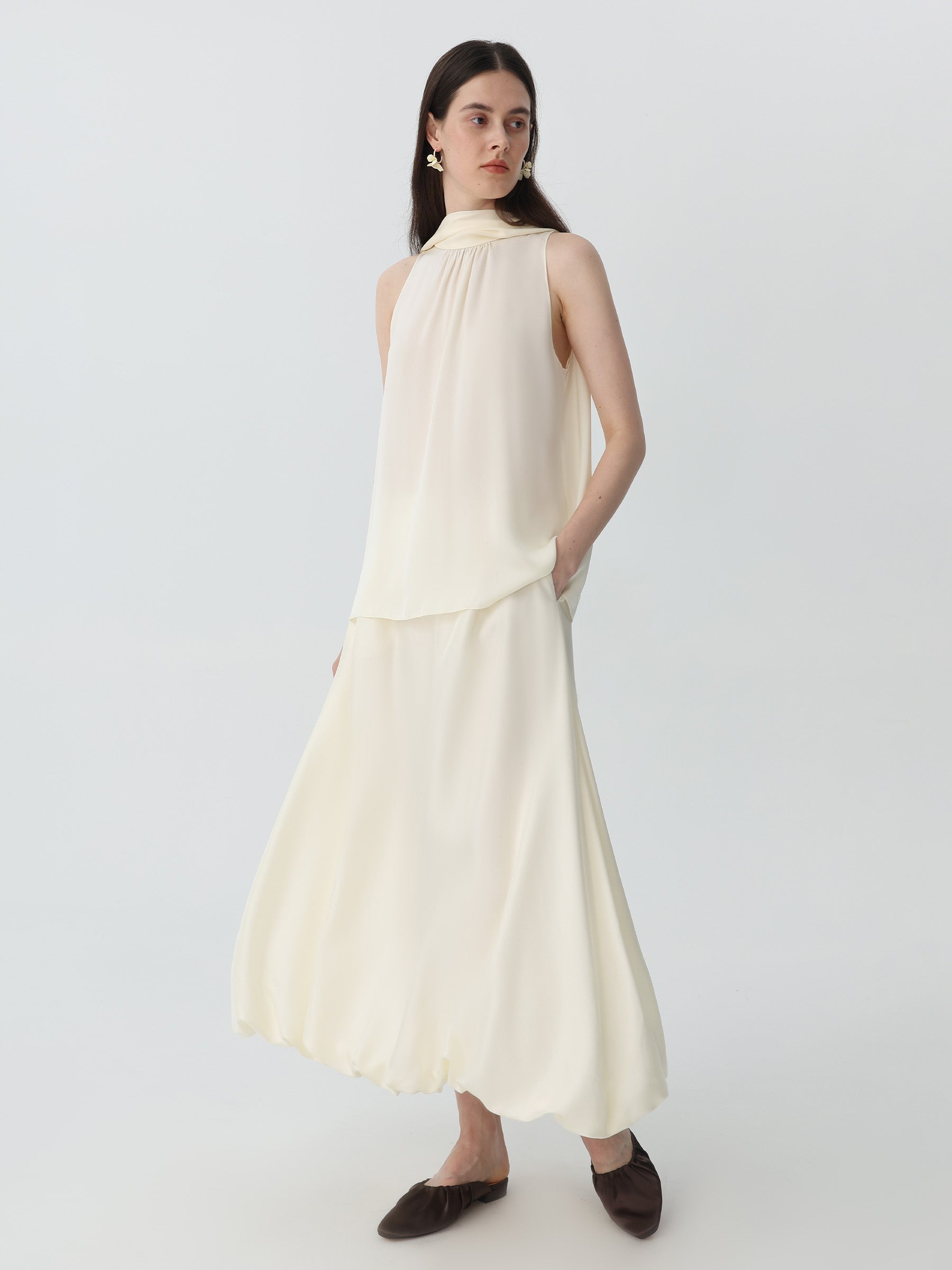 Sleeveless Turtleneck Ribbon Blouse in Silk #color_Ivory White